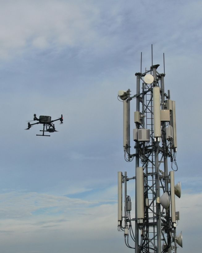 A photo of a cell phone tower taken with a drone