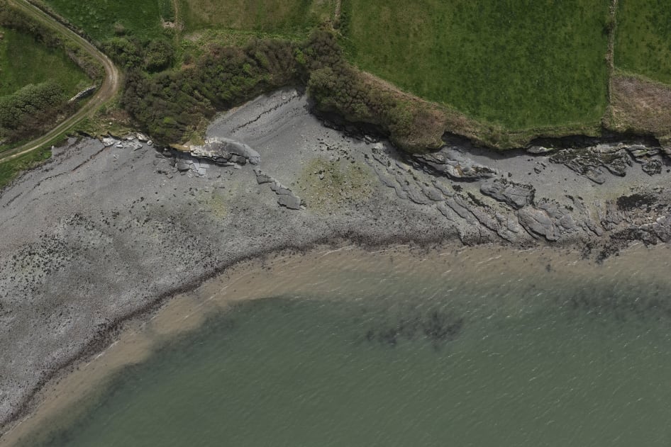 A typical image from the drone on this project showing a rocky beach area of coastline.