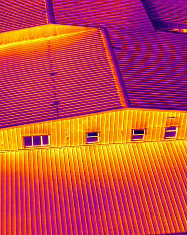 An image of a damaged building taken by a drone performing drone services for insurance.