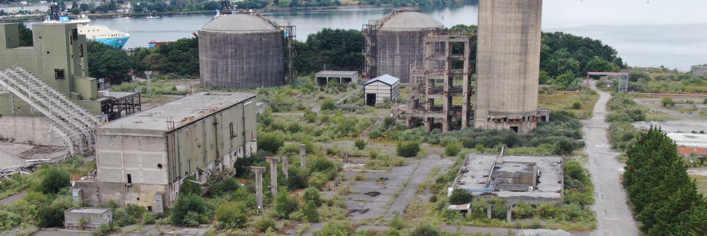 A UAV performing a drone inspection of industrial waste ground