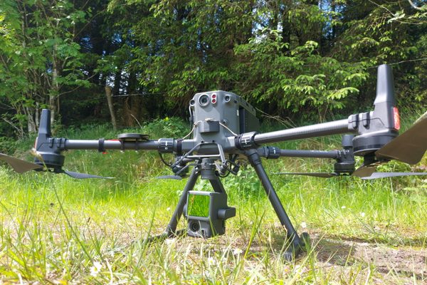 A drone fitted with a LiDAR sensor during a survey mission