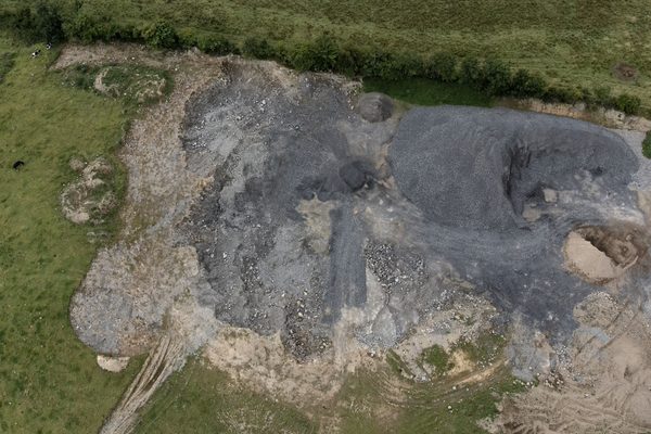 A quarry processing area being inspected by a drone