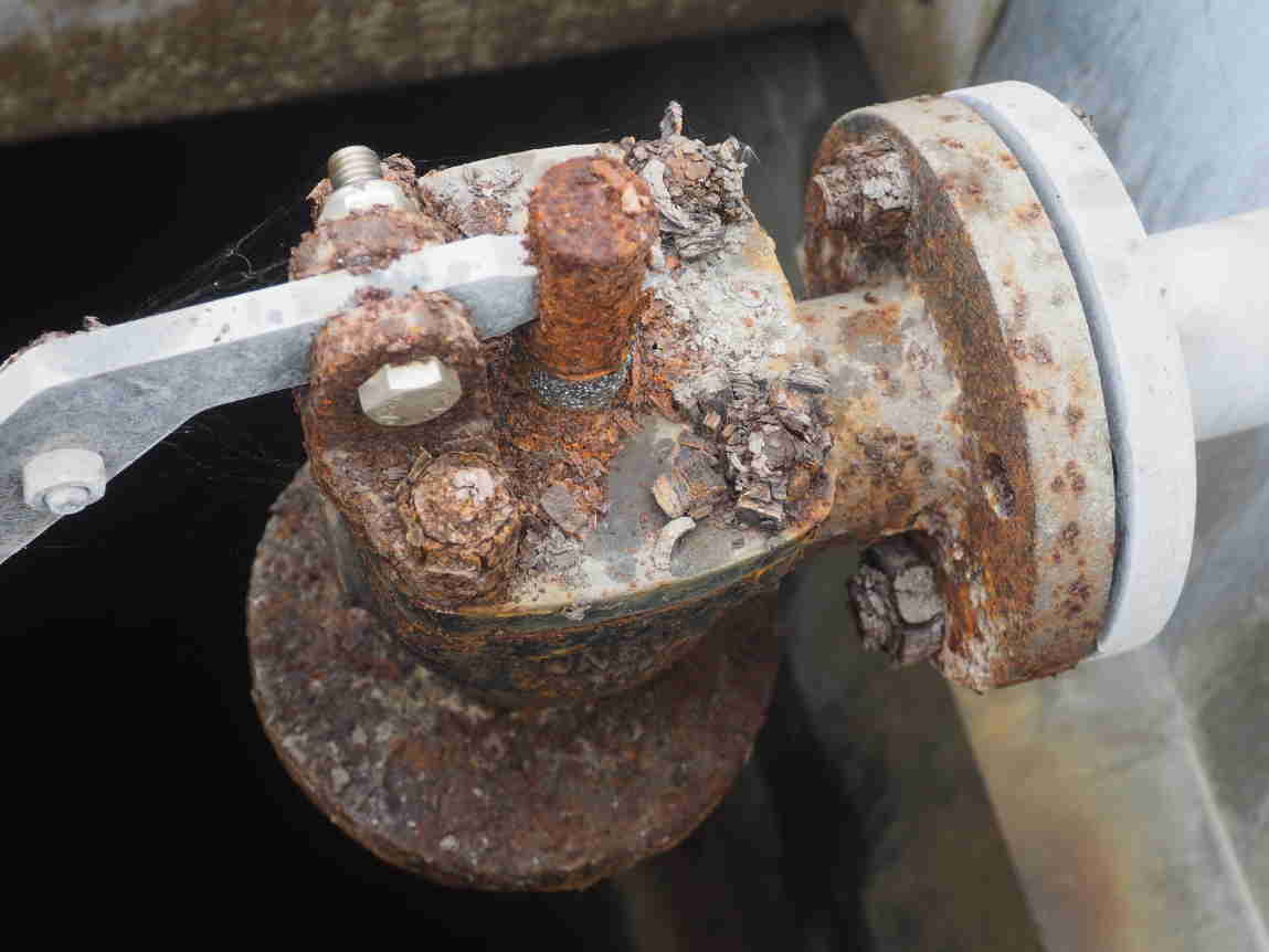 A severely corroded valve found on a confined space tank inspection