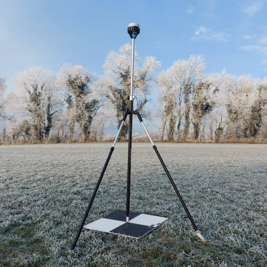 An image of a ground control point (GCP) being measured by a high precision GNSS unit.